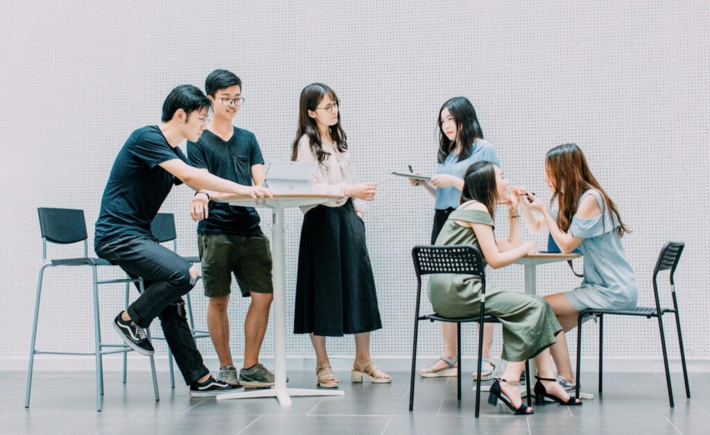 A group of IT engineers having a meeting at a company in Japan.